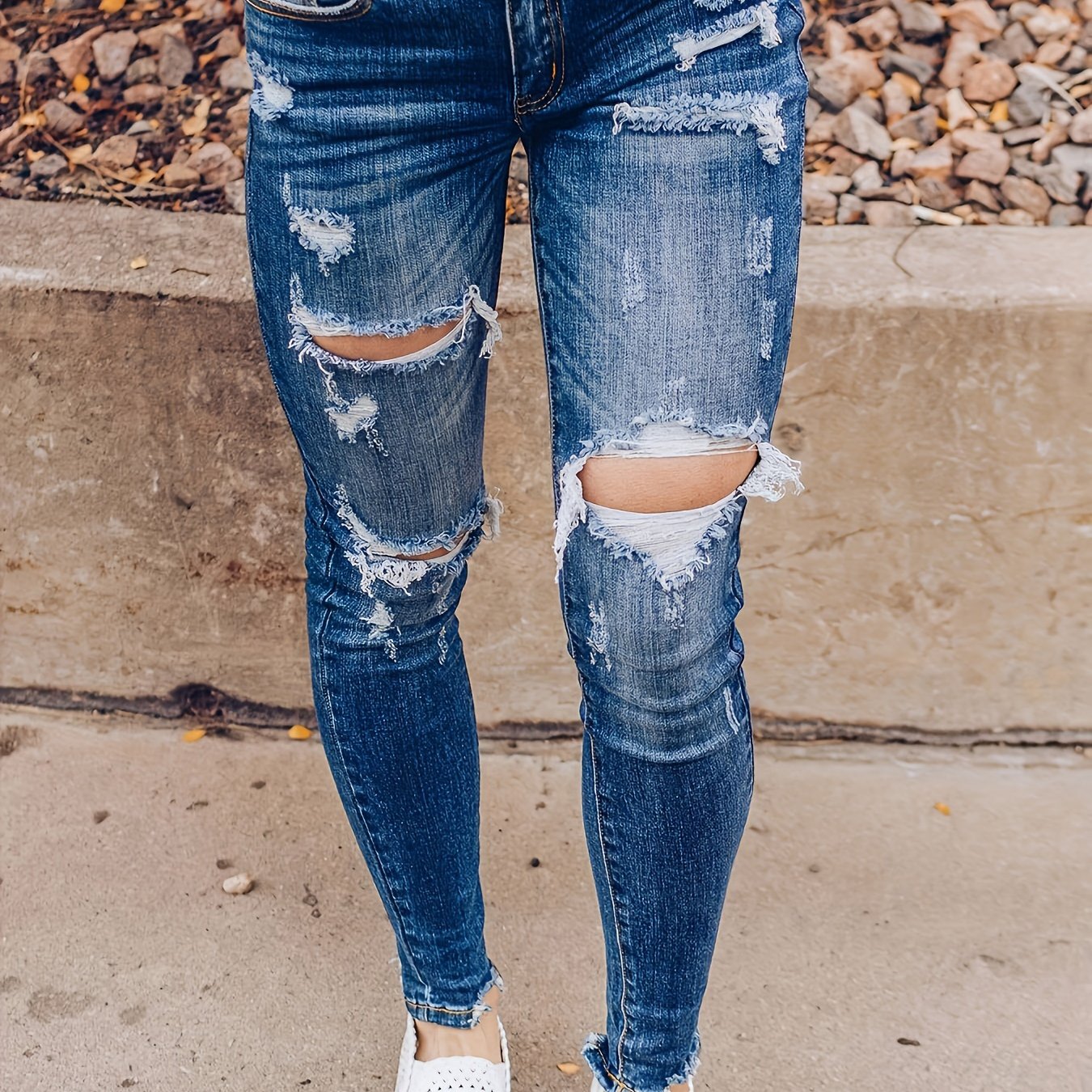 Vintage Distressed Skinny Jeans - Fashionable Ripped Detailing, High-Rise Fit, Trendy Denim Pants with Multiple Holes Design - Perfect for the Modern Womans Wardrobe
