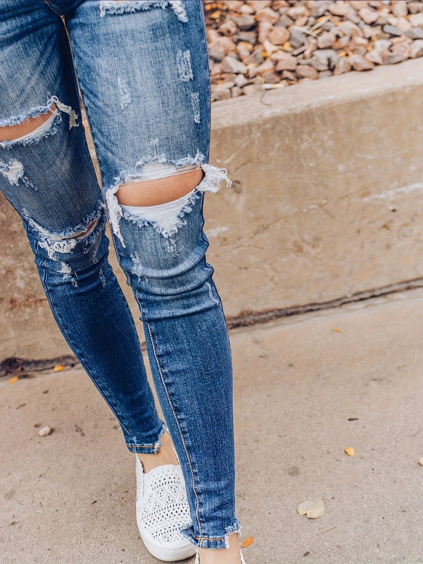 Vintage Distressed Skinny Jeans - Fashionable Ripped Detailing, High-Rise Fit, Trendy Denim Pants with Multiple Holes Design - Perfect for the Modern Womans Wardrobe