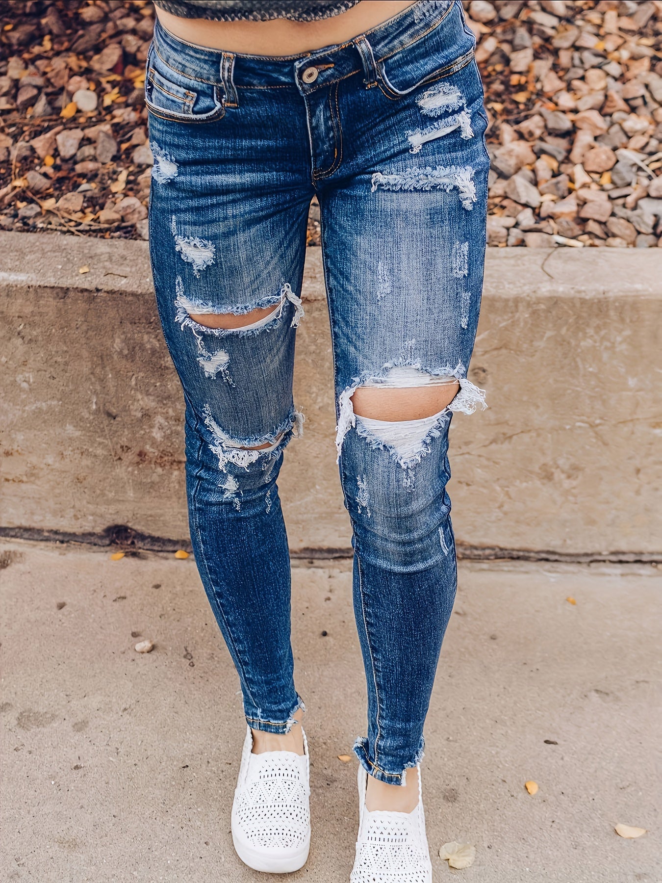 Vintage Distressed Skinny Jeans - Fashionable Ripped Detailing, High-Rise Fit, Trendy Denim Pants with Multiple Holes Design - Perfect for the Modern Womans Wardrobe