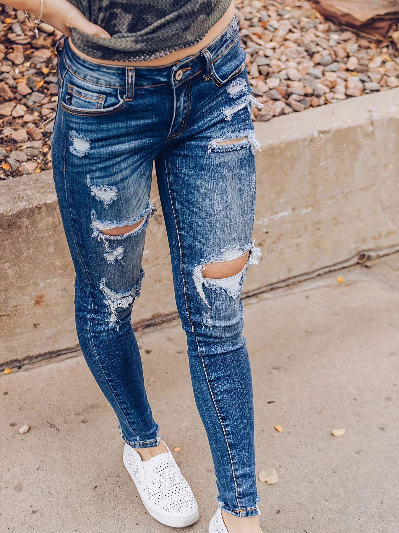 Vintage Distressed Skinny Jeans - Fashionable Ripped Detailing, High-Rise Fit, Trendy Denim Pants with Multiple Holes Design - Perfect for the Modern Womans Wardrobe